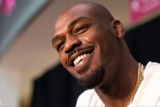 Jon Jones Soaks It In as 'F—k Tom Aspinall' Chants Break Out During DBX1 Weigh-Ins