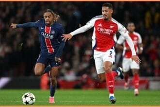 William Saliba in action against Bradley Barcola