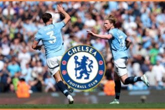 Kevin De Bruyne celebrates with Ruben Dias