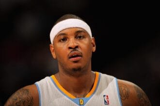 Carmelo Anthony responds when asked if the Denver Nuggets should retire from the 15 jersey or Nicola Jokic