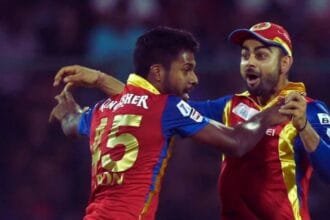 Varun Aaron and Virat Kohli