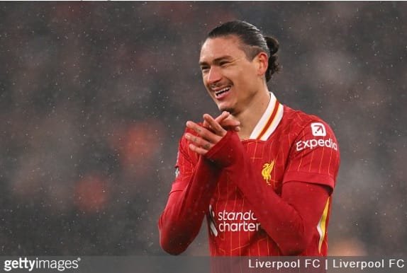 Darwin Nunes walks towards the Liverpool exit