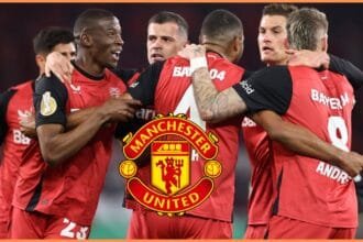 Jonathan Tah celebrates with his Bayer Leverkusen teammates