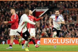 Rayan Cherki celebrates at Old Trafford