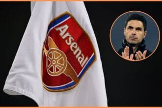 Arsenal logo on flag and manager Mikel Arteta