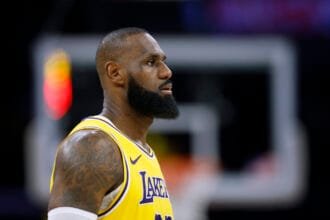 Kendrick Perkins highlights to LeBron James after commenting on the Luca Donchick deal: "Damn...".