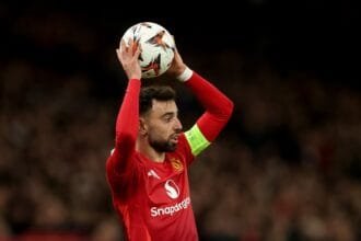 Bruno Fernandes takes a throw-in for Manchester United