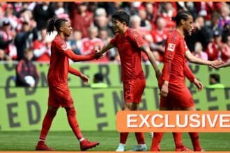 Kim Min-jae celebrates with Bayern Munich teammate Michael Olise