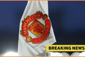 Manchester United corner flag and breaking news banner