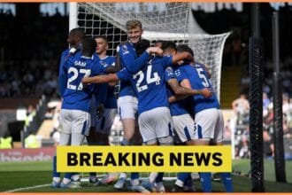 Michael Keane celebrates with his Everton teammates