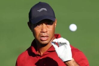 Tiger Woods - We open up a longer batter than "favors" and short iron play