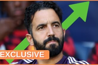 Ruben Amorim looks on with a green arrow rising behind him.