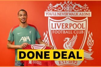 Hugo Ekitike posing with his Liverpool shirt