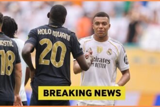 Randal Kolo Muani shakes hands with Kylian Mbappe