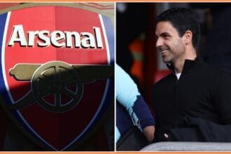 Arsenal club crest and manager Mikel Arteta