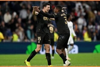 Cristhian Mosquera celebrates as Valencia beat Real Madrid at the Bernabeu