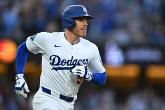 Dodgers' Freddie Freeman finishes Sunday's match after hitting the pitch on development
