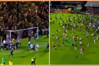Grimsby fans pitch invasion after beating Manchester United