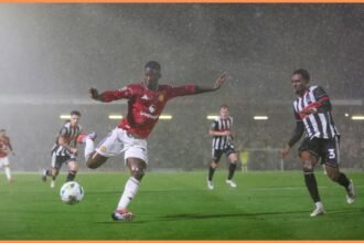 Kobbie Mainoo in action for Man United vs Grimsby