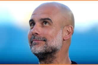 Manchester City manager Pep Guardiola smiling