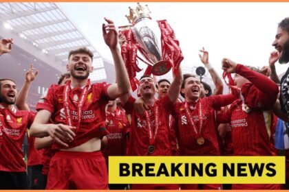 Harvey Elliott and his Liverpool teammates celebrating with the Premier League trophy