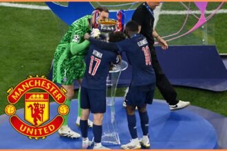 Gianluigi Donnarumma and his PSG teammates celebrate with the Champions League trophy