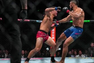 Johnny Walker denies the touch of fake gloves at UFC Shanghai and believes he broke Zhang Mingyang's leg
