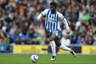 Carlos Baleba runs with the ball