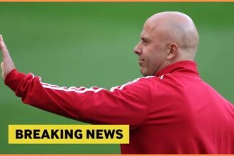 Arne Slot waving, and yellow