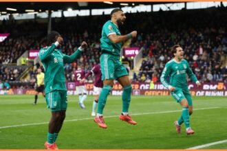 Mohamed Salah, Jeremie Frimpong, and Federico Chiesa celebrate Liverpool