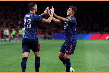 Mikel Merino celebrates with Martin Zubimendi in Arsenal
