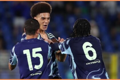 Aaron Bouwman celebrates with his Ajax teammates