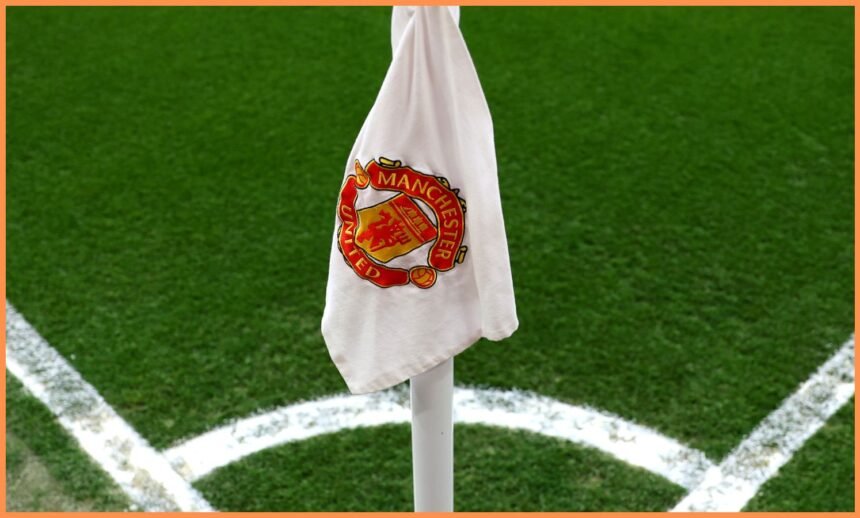 Close-up of Manchester United logo on corner flag