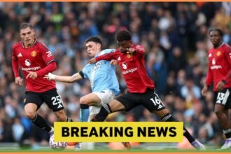 Manuel Ugarte in action for Manchester United against Manchester City