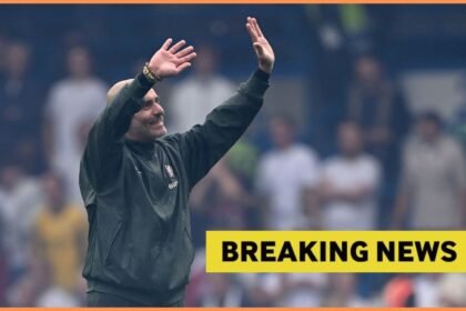 Chelsea manager Enzo Maresca waving to the fans at Stamford Bridge