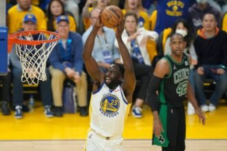 #23 Draymond Green of the Golden State Warriors dunks the ball during the first quarter against #42 Al Horford of the Boston Celtics during Game 5 of the 2022 NBA Finals at Chase Center on June 13, 2022 in San Francisco, California.