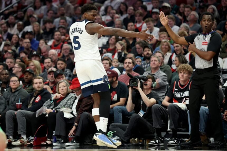 Minnesota Timberwolves guard Anthony Edwards celebrates after making a 3-point shot.