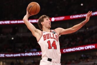 Chicago Bulls #14 Matas Bouzelis dunks during the second half of the game against the Detroit Pistons at the United Center.