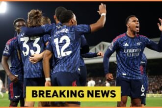 Arsenal players celebrate during the win at Fulham