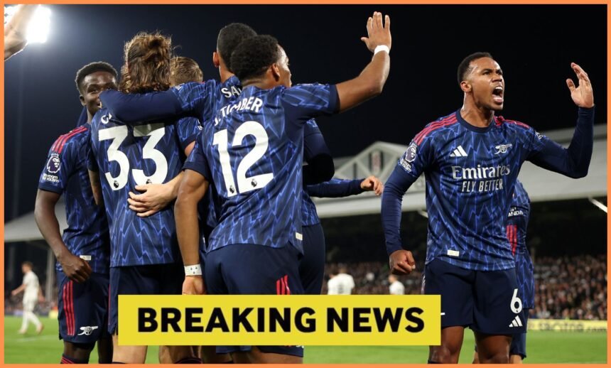 Arsenal players celebrate during the win at Fulham