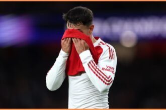 Martin Zubimendi wipes his face during Arsenal vs Atletico Madrid