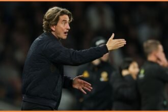 Tottenham manager Thomas Frank gestures during the Wolves game