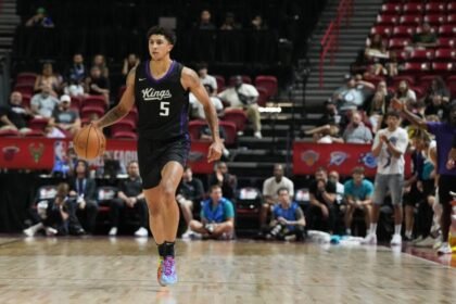 #5 Neek Clifford of the Sacramento Kings dribbles against the Charlotte Hornets during the second half of the 2025 NBA Summer League Championship game at Thomas & Mack Center.
