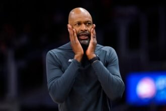 Orlando Magic head coach Jamal Mosley reacts during the second quarter of the game against the Atlanta Hawks at State Farm Arena.