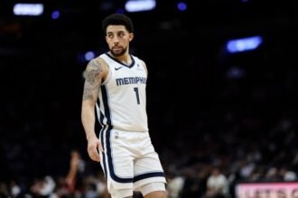 Memphis Grizzlies No. 1 Scottie Pippen Jr. watches the fourth quarter of a game against the Miami Heat at Caseya Center on April 3, 2025 in Miami, Florida.
