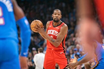 Kevin Durant #7 of the Houston Rockets appears to be attempting a pass during the first half of the game against the Oklahoma City Thunder.