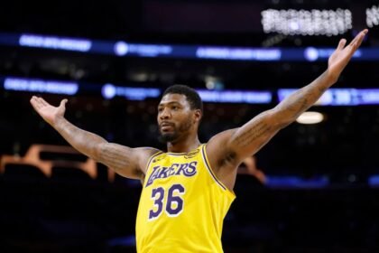 Marcus Smart #36 of the Los Angeles Lakers reacts to a foul after a basket during the Warriors' 119-109 win in the season opener between the Golden State Warriors and Los Angeles Lakers at Crypto.com Arena.