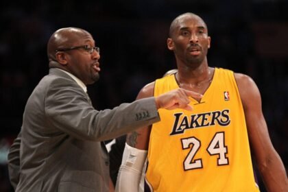 Kobe Bryant #24 of the Los Angeles Lakers speaks with head coach Mike Brown during the game against the Utah Jazz at Staples Center.