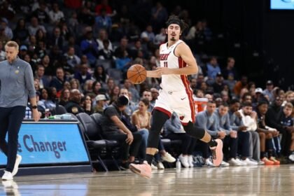 Jaime Jaquez Jr., No. 11 of the Miami Heat, brings the ball up the court during a game against the Memphis Grizzlies at FedExForum on October 24, 2025 in Memphis, Tennessee.