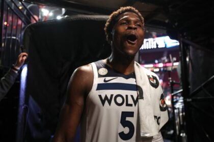 Minnesota Timberwolves star Anthony Edwards celebrates after winning the 2025-26 season opener against the Portland Trail Blazers.